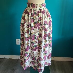 size small/ Vintage 90s floral jersey knit midi skirt with pockets button front
